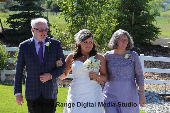 Mom and dad with the bride.