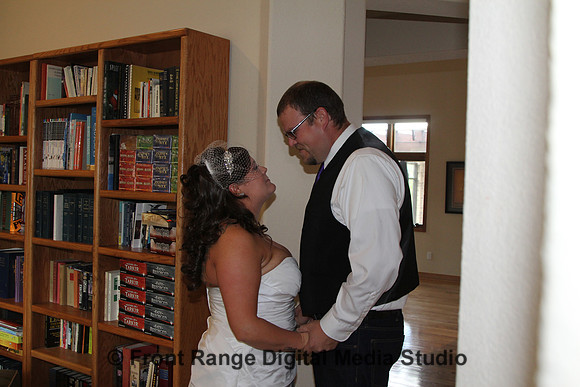 The groom sees the dress for the first time.