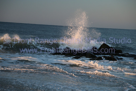 Wave hitting jetty at Cape May, NJ