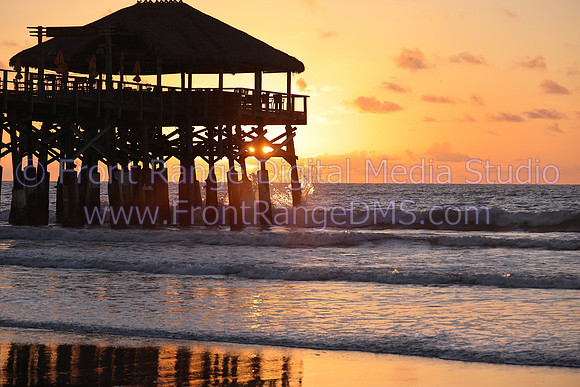 Cocoa Beach Pier Sunrise Through Pilings